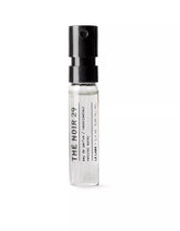 Le Labo The Noir 29 bottle glows with amber tones for a versatile day-to-night fragrance
