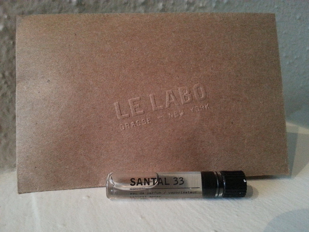 Le Labo Santal 33 bottle close-up highlighting a woody, compelling scent for elegant evenings.