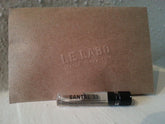 Le Labo Santal 33 bottle close-up highlighting a woody, compelling scent for elegant evenings.