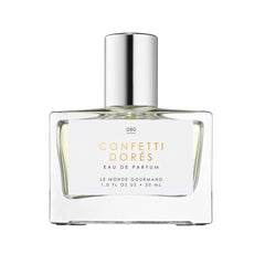 Le Monde Gourmand Confetti Dorés spray bottle for festive, long-lasting fragrance.