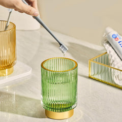 LEICURACE toothbrush holder with gold base adds elegance to your bathroom.