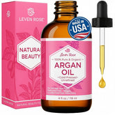 Leven Rose Argan Oil bottle front shows pure Moroccan oil for hair shine and skin softness.