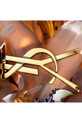 Yves Saint Laurent Libre Flowers and Flames bottle top showcases chic design for confident daily wear.
