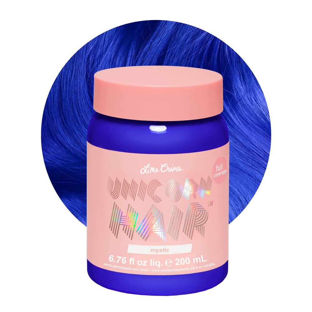 Lime Crime Unicorn Hair Dye Mystic bottle pour reveals vibrant electric blue for bold at-home color.