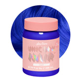 Lime Crime Unicorn Hair Dye Mystic bottle pour reveals vibrant electric blue for bold at-home color.