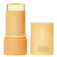 Live Tinted Hueguard stick on skin applying invisible SPF 50 protection