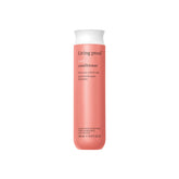 Living Proof Curl Conditioner bottle in sleek design for easy curl definition.