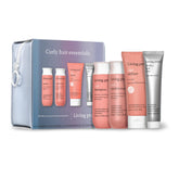 Living Proof curly shampoo travel-size bottle defines and strengthens curls