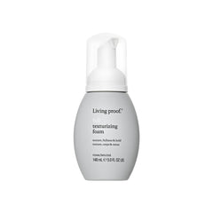 Living Proof Full Texturizing Foam dispenses action showing lightweight texture being applied
