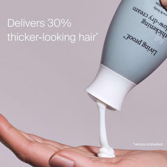 Living Proof Full Thickening Blow-Dry Cream texture swatch shows creamy, lightweight formula.