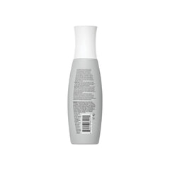Living proof Full Volume Root-Lifting Spray in action dispensing a mist for lightweight hold.