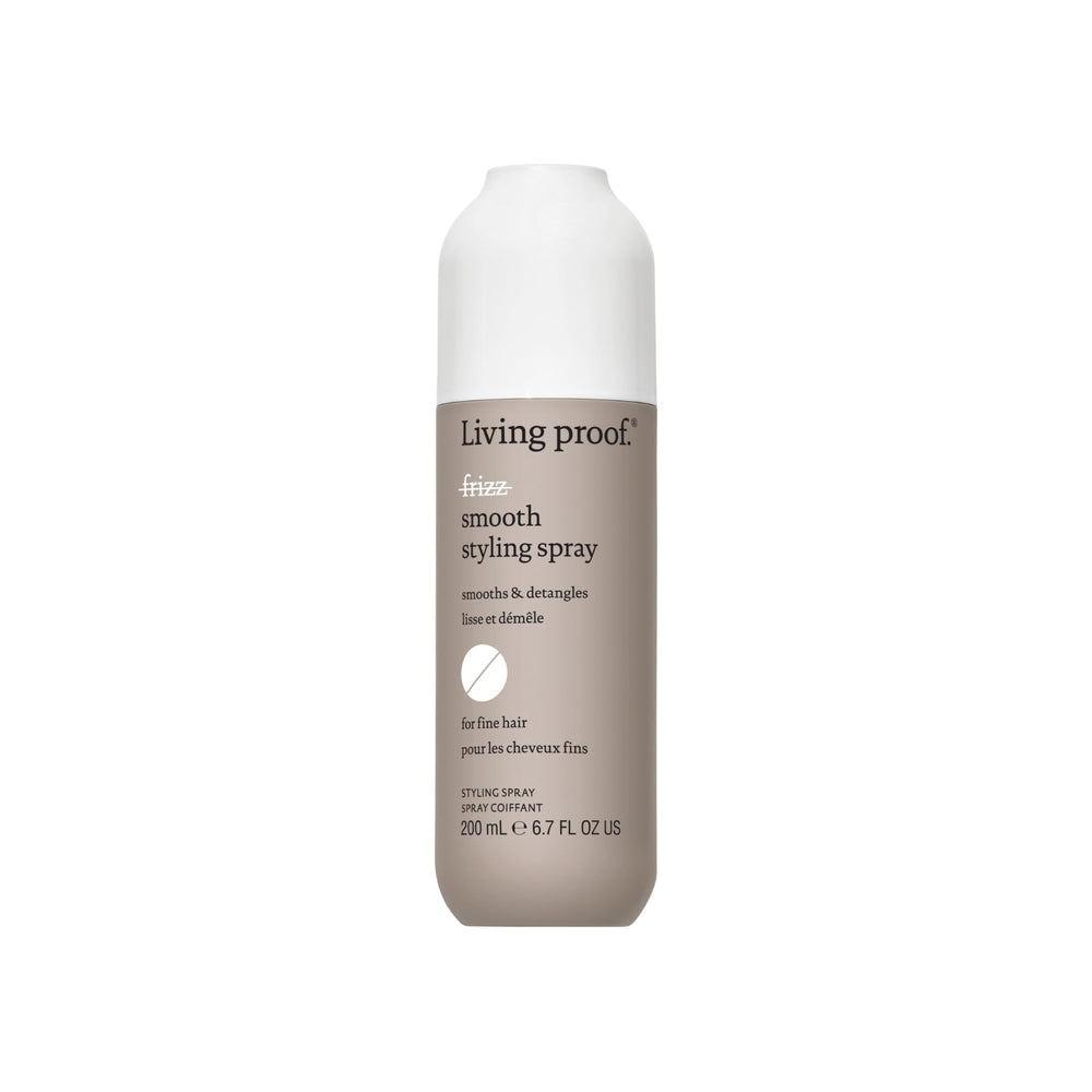 Living Proof No Frizz Smooth Styling Spray bottle demonstrates lightweight frizz control for fine hair.