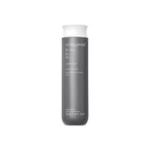 Living Proof Perfect Hair Day Conditioner bottle pour showing easy application and hydration