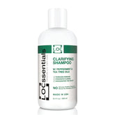 LOCssentials clarifying shampoo bottle angle demonstrates residue-free cleansing for locs and protective styles.