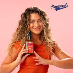 Lola From Rio thickening effect demonstrated with visible volume on fine hair.