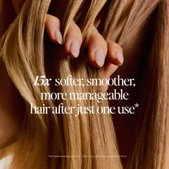 LolaVie Glossing Detangler application mid-lengths, silky glide and hydration.