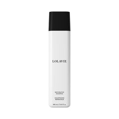 Lolavie Restorative Shampoo bottle pour demonstrates a nourishing cleanse.
