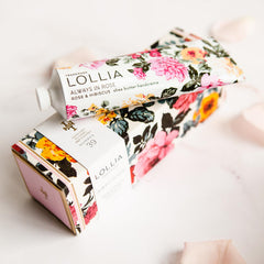 Jar showing shea and cocoa butter in LOLLIA handcreme for rich moisture