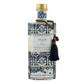 Lollia Dream Bubble Bath pour bottle showing luxurious bubbles and relaxing aroma.