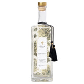 LOLLIA Elegance Bubble Bath bottle in a spa setting for a relaxing soak.