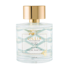 LOLLIA Wish bottle front with gold bees on blue foulard signaling luxury fragrance.