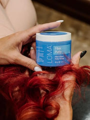 LOMA Fiber Putty in hands demonstrates easy distribution for quick shaping.