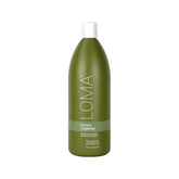Loma Nourishing Conditioner bottle pour highlights hydration for dry hair