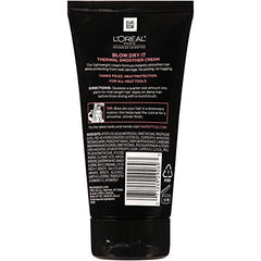 L'Oreal Paris Blow Dry It application on damp hair for heat protection.