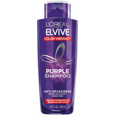 L'Oreal Paris Elvive Color Vibrancy Purple Shampoo bottle neutralizes brassiness for cooler tones.