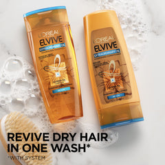 L'Oreal Paris Elvive Extraordinary Oil Conditioner dispenses product smoothly for quick detangling prep.