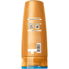 L'Oreal Paris Elvive Extraordinary Oil Conditioner bottle with pump suggests easy, mess-free application.
