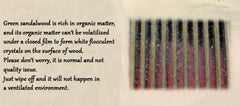 Close-up of sandalwood comb teeth for smooth glide