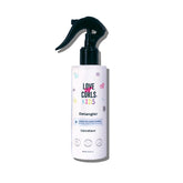 Love Ur Curls Kids Detangler spray bottle demonstrates gentle detangling with watermelon seed oil.