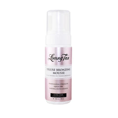 Loving Tan Deluxe Ultra Dark bottle shows natural-looking tan with long-lasting glow