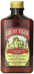 Lucky Tiger Liquid Cream Shave bottle pouring a rich lather for a smooth shave.