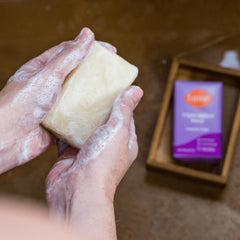 Lume aluminum-free baking soda-free deodorant tube on clean surface.