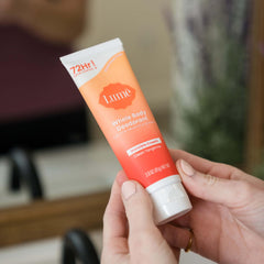 Lume application demonstrates pea-sized amount for targeted odor protection.