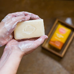 Lume bar soap close-up demonstrates gentle cleanse for smooth skin