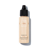LUMINESS Air Silk 010 bottle closeup shows satin finish and hydration.