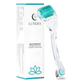 Lunèra derma roller on the face with 0.25mm titanium needles for smoother skin.