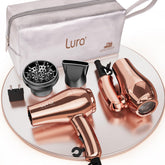 LURA dual-voltage travel hair dryer front view showcases compact, easy-pack design for on-the-go styling.