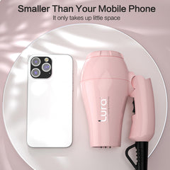 LURA foldable travel hair dryer mini pink in-use for quick travel drying