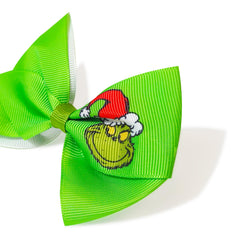 Alligator clip keeps hair secure during active play.
