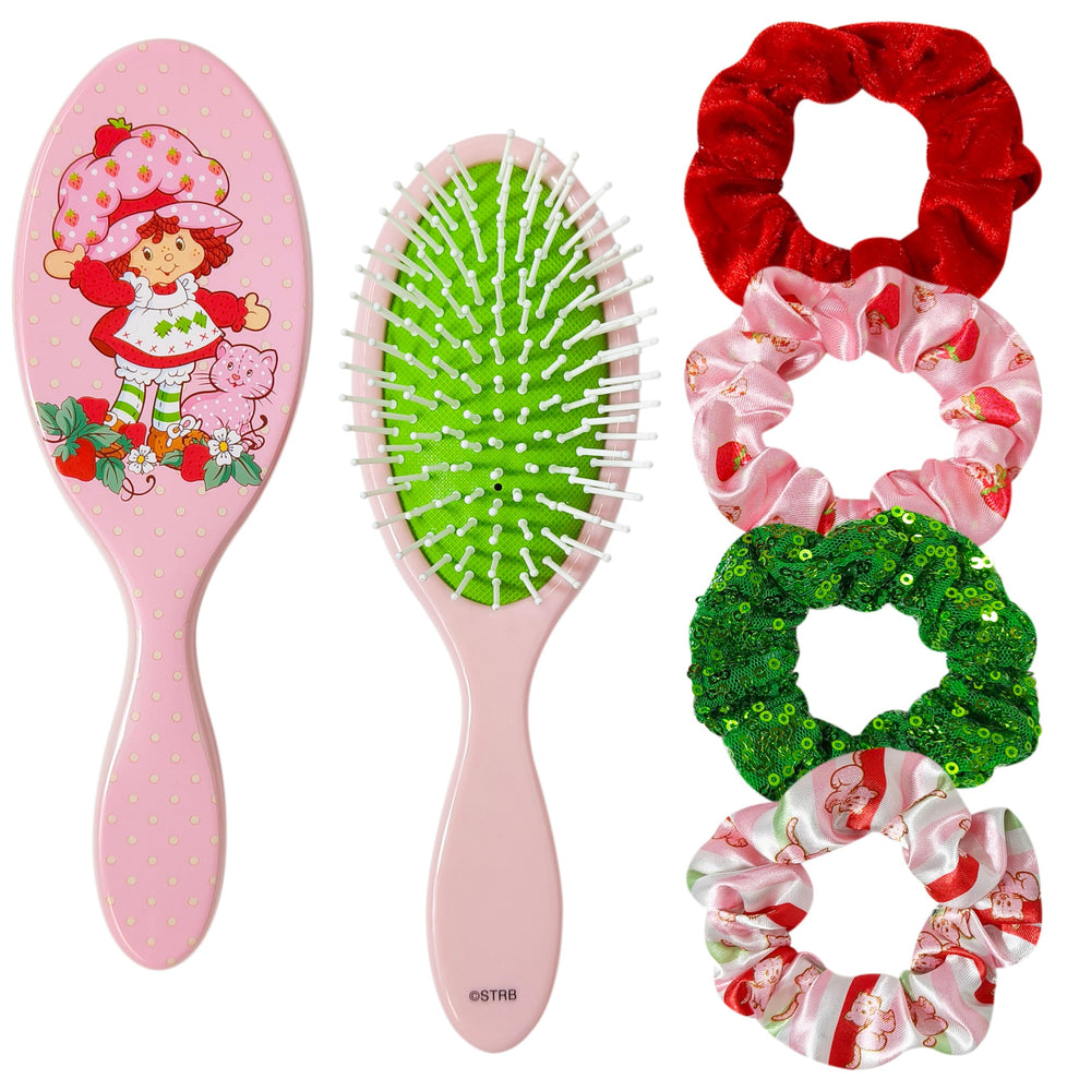 LUV HER Strawberry Shortcake hairbrush close-up showing gentle detangling for kids.