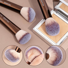 MAANGE aluminum-handle makeup brushes close-up showing durable grip