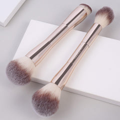 MAANGE flat angled foundation brush follows facial contours for precise coverage.