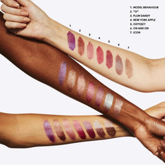 MAC Frost Lipstick Plum Dandy wand close-up showing smooth application.