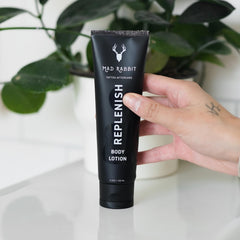 Mad Rabbit Replenish cream texture close-up shows light, non-greasy moisture.