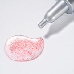 Madeca Derma Elastic Firming Ampoule dropper close-up emphasizes microbiomes and peptides for elasticity.