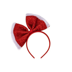 Madison Tyler oversized Christmas bow headband in red glitter adds festive sparkle for holiday photos.